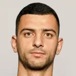 T. Ali